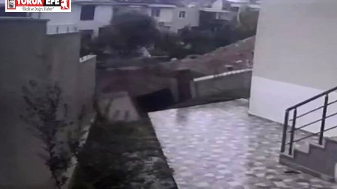 Bahçe duvarı yıkıldı, o anları güvenlik kamerası kaydetti