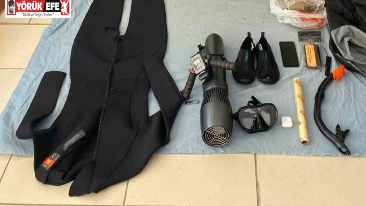 Sisam Adası’na denizden sualtı scooter ile geçmeye çalışırken yakalandı